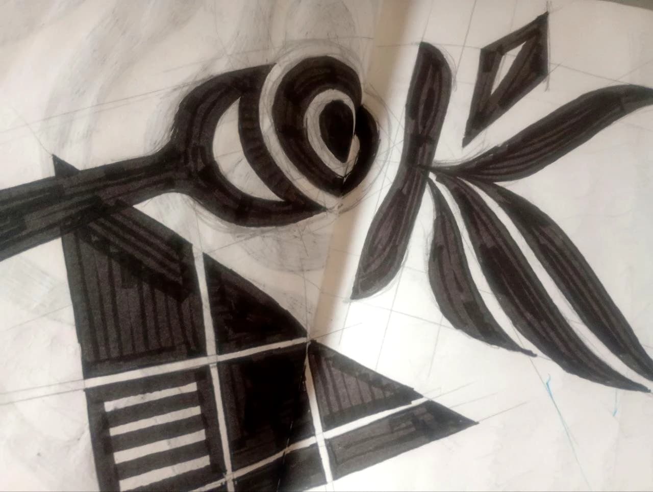 Black geometric leaves and concentric shapes.