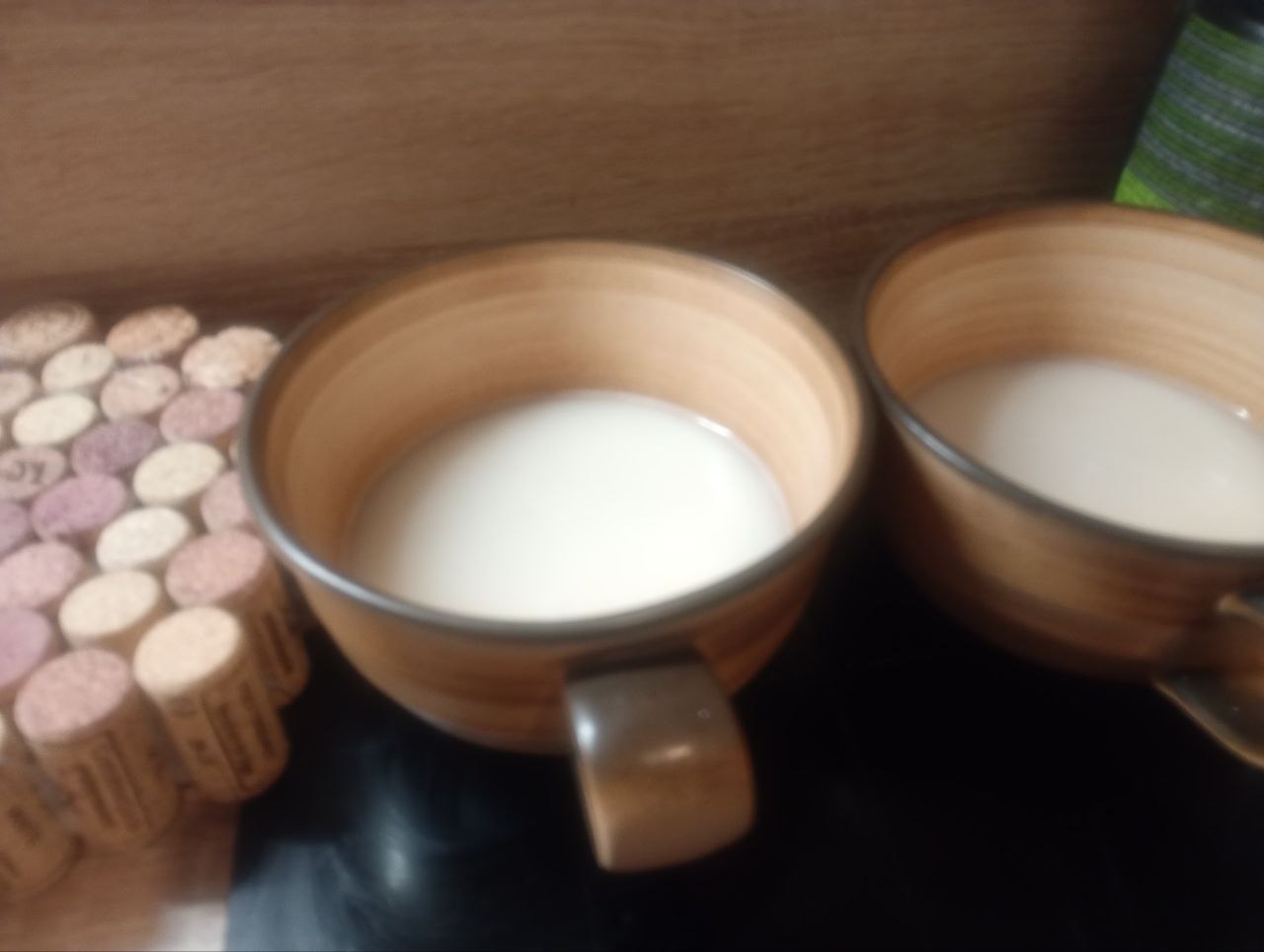 Two bowls containing the initial white oat and yogurt mixture